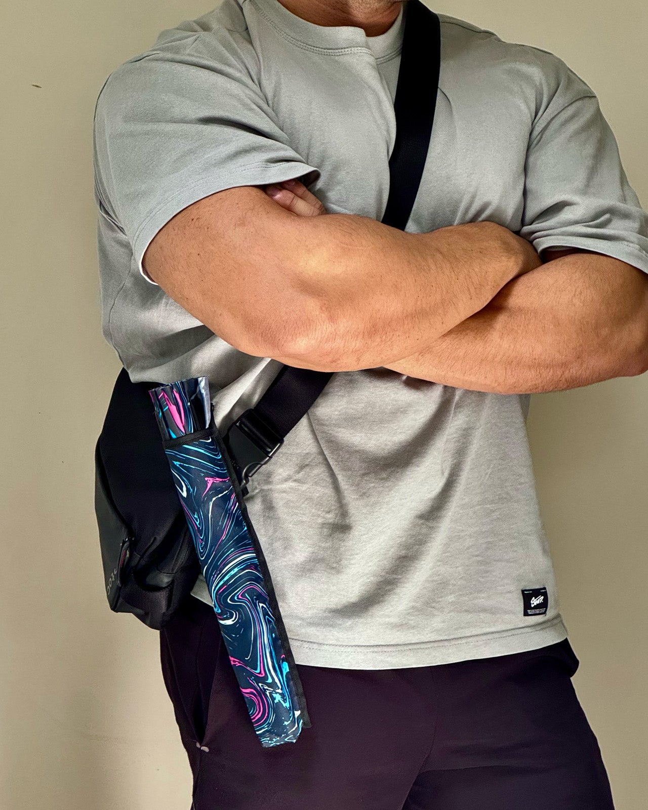 Fan holster attached to bag strap for hands-free convenience