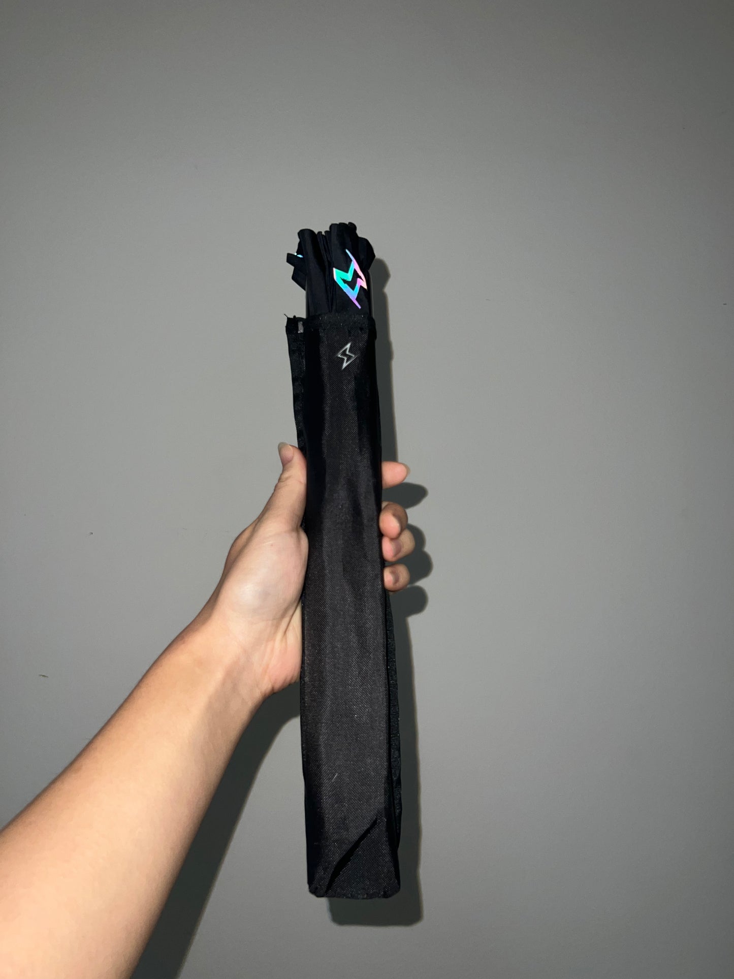 Electric Eden fan holster showcasing leg wrap and bag strap attachment